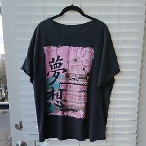 Black Graphic T-Shirt with Pink and Green Design